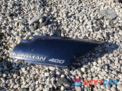Zdjęcie 9 z 11 samochodu: 2004 SUZUKI AN400 K3 VIN:JS1CK43A942100427 - miniatura