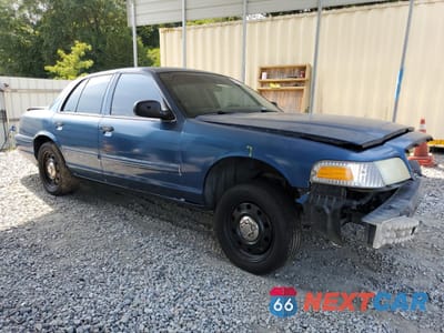 Czwarte zdjęcie samochodu z boku: 2011 FORD CROWN VICTORIA POLICE INTERCEPTOR VIN:2FABP7BVXBX135387 - miniatura