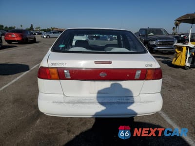 Zdjęcie 6 z 12 samochodu: 1996 NISSAN SENTRA E VIN:1N4AB41D3TC713040 - miniatura