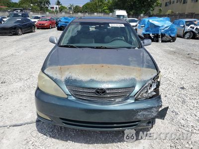 Piąte zdjęcie samochodu w środku: 2004 TOYOTA CAMRY LE VIN:4T1BE32K54U373166 - miniatura