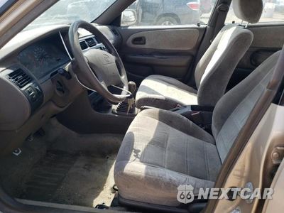 Zdjęcie 7 z 12 samochodu: 1997 TOYOTA COROLLA DX VIN:1NXBB02E4VZ522038 - miniatura