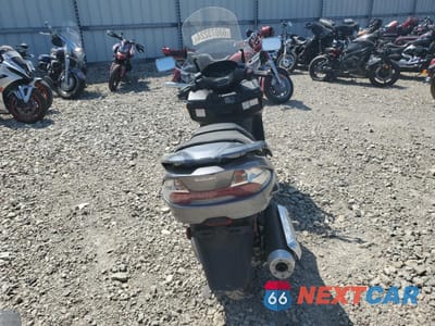 Czwarte zdjęcie samochodu z boku: 2007 SUZUKI AN400 VIN:JS1CK44A772102258 - miniatura