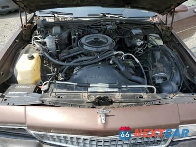 Zdjęcie 11 z 12 samochodu: 1988 CHEVROLET CAPRICE CLASSIC BROUGHAM VIN:1G1BU51H9JR110095 - miniatura