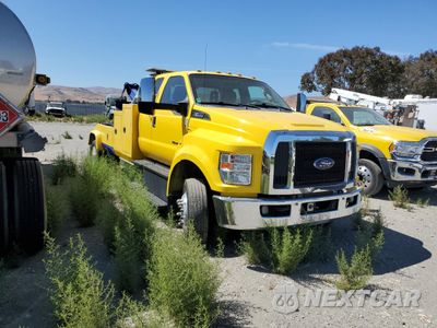 Czwarte zdjęcie samochodu z boku: 2016 FORD F650 SUPER DUTY VIN:1FDWX6DE4GDA03481 - miniatura