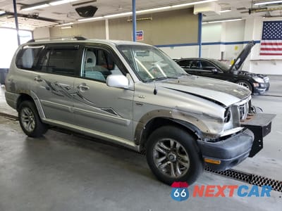 Czwarte zdjęcie samochodu z boku: 2003 SUZUKI XL7 PLUS VIN:JS3TX92V734105915 - miniatura