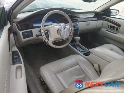 Zdjęcie 8 z 14 samochodu: 2001 CADILLAC ELDORADO ESC VIN:1G6EL12YX1B100671 - miniatura