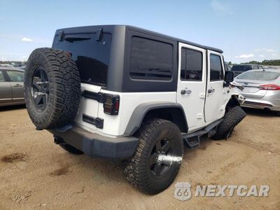 Trzecie zdjęcie samochodu z tyłu: 2016 JEEP WRANGLER UNLIMITED SPORT VIN:1C4BJWDG4GL104824 - miniatura