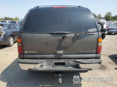 Zdjęcie 6 z 12 samochodu: 2000 CHEVROLET TAHOE C1500 VIN:1GNEC13T0YJ128213 - miniatura