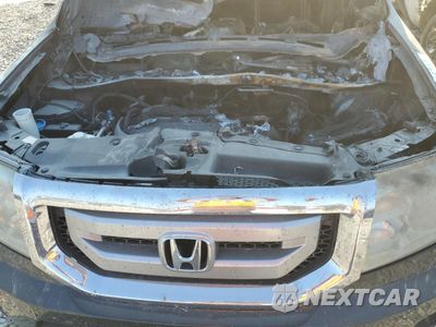 Zdjęcie 12 z 13 samochodu: 2011 HONDA PILOT LX VIN:5FNYF4H24BB101643 - miniatura