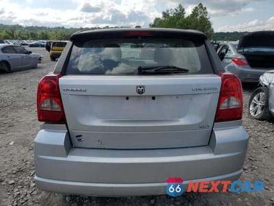 Zdjęcie 6 z 11 samochodu: 2010 DODGE CALIBER SXT VIN:1B3CB4HA7AD661063 - miniatura