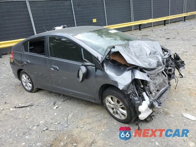 Czwarte zdjęcie samochodu z boku: 2011 HONDA INSIGHT EX VIN:JHMZE2H70BS012810 - miniatura