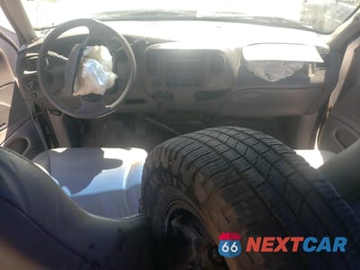 Zdjęcie 8 z 15 samochodu: 1999 FORD EXPEDITION VIN:1FMPU18LXXLB99568 - miniatura