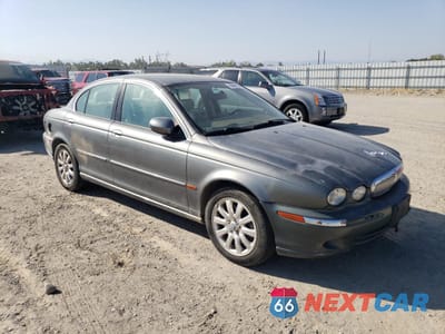 Czwarte zdjęcie samochodu z boku: 2002 JAGUAR X-TYPE 2.5 VIN:SAJEA51DX2XC80042 - miniatura
