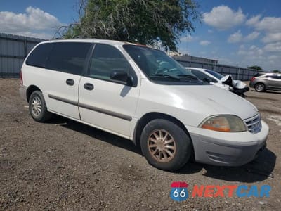 Czwarte zdjęcie samochodu z boku: 1999 FORD WINDSTAR LX VIN:2FMZA5140XBB07234 - miniatura