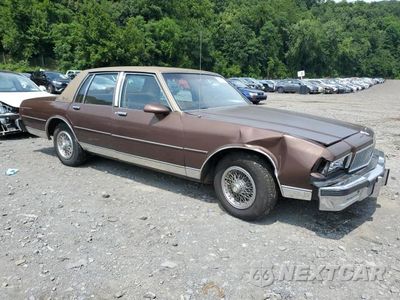 Czwarte zdjęcie samochodu z boku: 1988 CHEVROLET CAPRICE CLASSIC BROUGHAM VIN:1G1BU51H9JR110095 - miniatura