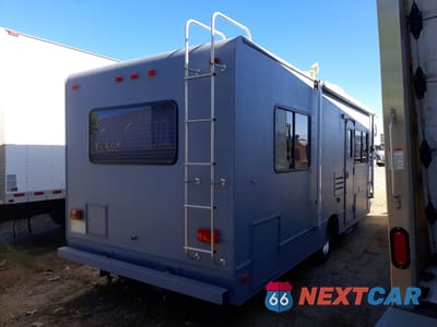 Czwarte zdjęcie samochodu z boku: 2000 CHEVROLET EXPRESS G3500 VIN:1GBJG31J1Y1170614 - miniatura