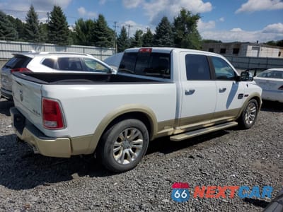 Trzecie zdjęcie samochodu z tyłu: 2015 RAM 1500 LONGHORN VIN:1C6RR7WM7FS561008 - miniatura