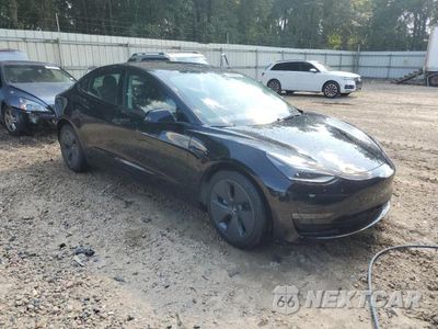 Czwarte zdjęcie samochodu z boku: 2023 TESLA MODEL 3 VIN:5YJ3E1EBXPF662193 - miniatura
