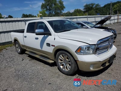 Czwarte zdjęcie samochodu z boku: 2015 RAM 1500 LONGHORN VIN:1C6RR7WM7FS561008 - miniatura
