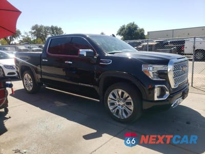 Czwarte zdjęcie samochodu z boku: 2020 GMC SIERRA K1500 DENALI VIN:1GTU9FELXLZ152509 - miniatura
