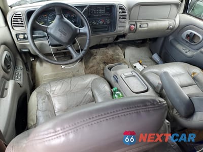 Zdjęcie 8 z 14 samochodu: 1999 GMC YUKON VIN:1GKEK13R9XJ757780 - miniatura