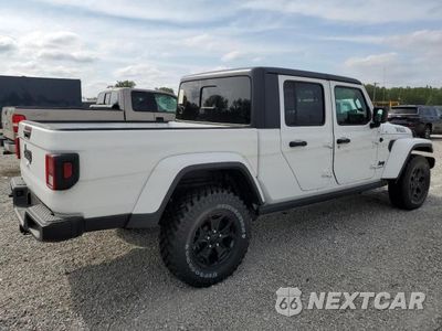 Trzecie zdjęcie samochodu z tyłu: 2021 JEEP GLADIATOR SPORT VIN:1C6HJTAGXML577448 - miniatura