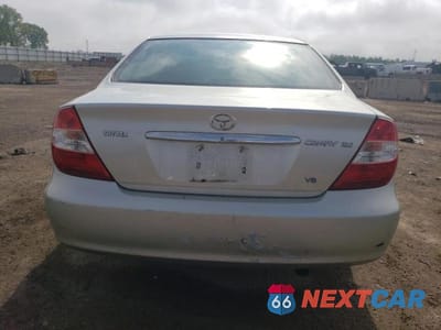 Zdjęcie 6 z 12 samochodu: 2002 TOYOTA CAMRY LE VIN:JTDBF30KX20001377 - miniatura