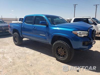 Czwarte zdjęcie samochodu z boku: 2016 TOYOTA TACOMA DOUBLE CAB VIN:5TFCZ5AN6GX012701 - miniatura