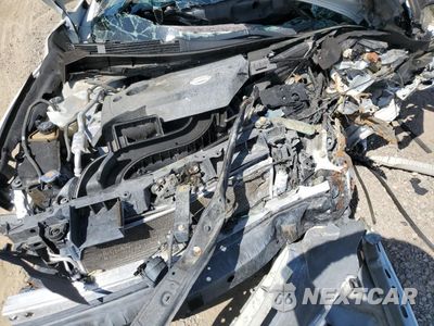 Zdjęcie 12 z 13 samochodu: 2014 NISSAN ALTIMA 2.5 VIN:1N4AL3AP4EN208052 - miniatura
