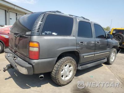 Trzecie zdjęcie samochodu z tyłu: 2000 CHEVROLET TAHOE C1500 VIN:1GNEC13T0YJ128213 - miniatura