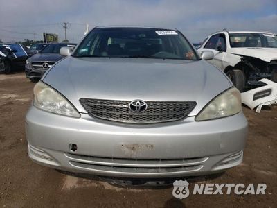 Piąte zdjęcie samochodu w środku: 2002 TOYOTA CAMRY LE VIN:JTDBF30KX20001377 - miniatura