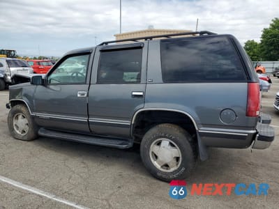 Drugie zdjęcie samochodu z przodu: 1999 GMC YUKON VIN:1GKEK13R9XJ757780 - miniatura