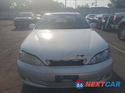 Piąte zdjęcie samochodu w środku: 2000 LEXUS ES 300 BASE VIN:JT8BF28G4Y5077200 - miniatura