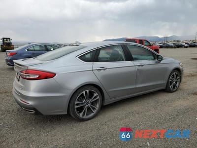 Trzecie zdjęcie samochodu z tyłu: 2020 FORD FUSION TITANIUM VIN:3FA6P0D98LR203369 - miniatura