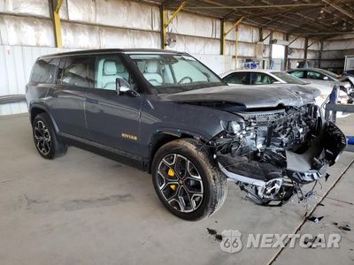 Czwarte zdjęcie samochodu z boku: 2023 RIVIAN R1S ADVENTURE VIN:7PDSGABA9PN007163 - miniatura