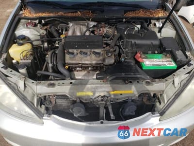 Zdjęcie 11 z 12 samochodu: 2002 TOYOTA CAMRY LE VIN:JTDBF30KX20001377 - miniatura