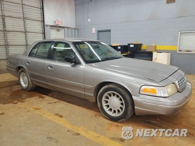 Czwarte zdjęcie samochodu z boku: 2002 FORD CROWN VICTORIA LX VIN:2FAFP74W92X159560 - miniatura