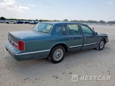 Trzecie zdjęcie samochodu z tyłu: 1996 LINCOLN TOWN CAR EXECUTIVE VIN:1LNLM81WXTY672992 - miniatura