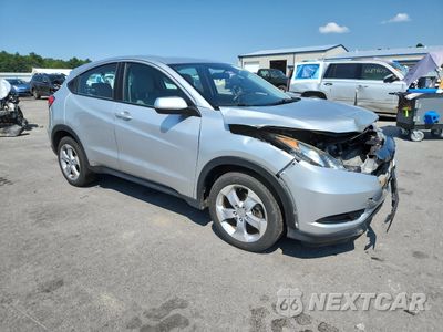 Czwarte zdjęcie samochodu z boku: 2016 HONDA HR-V LX VIN:3CZRU6H32GM720432 - miniatura
