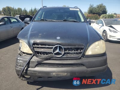 Piąte zdjęcie samochodu w środku: 1999 MERCEDES-BENZ ML 320 VIN:4JGAB54E2XA142397 - miniatura