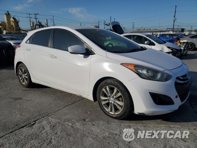Czwarte zdjęcie samochodu z boku: 2014 HYUNDAI ELANTRA GT VIN:KMHD35LH2EU191780 - miniatura