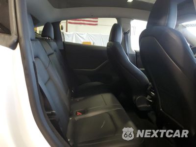 Zdjęcie 10 z 14 samochodu: 2023 TESLA MODEL Y VIN:7SAYGDEE0PA103666 - miniatura
