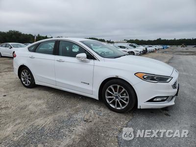 Czwarte zdjęcie samochodu z boku: 2017 FORD FUSION SE HYBRID VIN:3FA6P0LUXHR409242 - miniatura