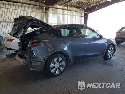 Trzecie zdjęcie samochodu z tyłu: 2023 TESLA MODEL Y VIN:7SAYGDEE4PF620455 - miniatura