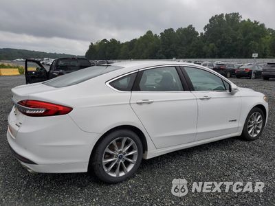 Trzecie zdjęcie samochodu z tyłu: 2017 FORD FUSION SE HYBRID VIN:3FA6P0LU5HR359592 - miniatura