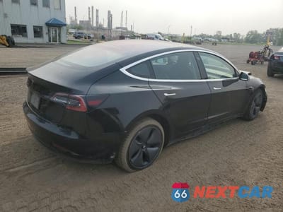 Trzecie zdjęcie samochodu z tyłu: 2019 TESLA MODEL 3 VIN:5YJ3E1EA3KF329320 - miniatura