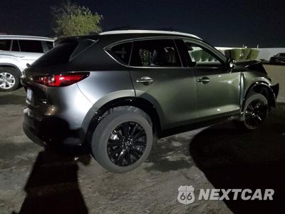 Trzecie zdjęcie samochodu z tyłu: 2024 MAZDA CX-5 PREMIUM VIN:JM3KFBDY8R0535696 - miniatura