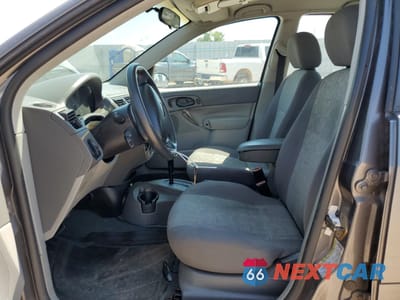 Zdjęcie 7 z 14 samochodu: 2005 FORD FOCUS ZX4 VIN:1FAFP34N35W112850 - miniatura