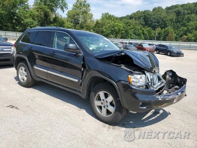 Czwarte zdjęcie samochodu z boku: 2013 JEEP GRAND CHEROKEE LAREDO VIN:1C4RJFAG4DC634550 - miniatura