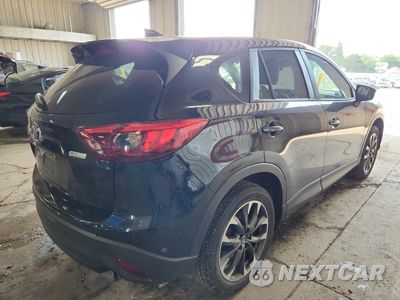Trzecie zdjęcie samochodu z tyłu: 2016 MAZDA CX-5 GT VIN:JM3KE4DY9G0640436 - miniatura